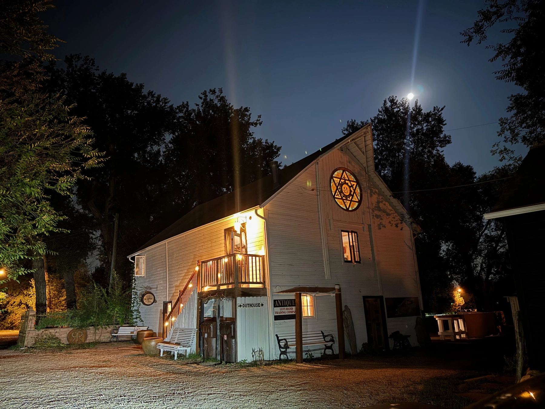 The barn at night under a full moon