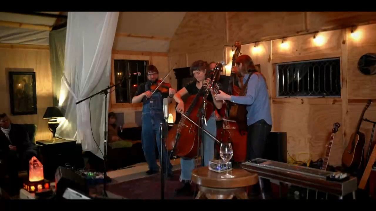 A band playing in the barn